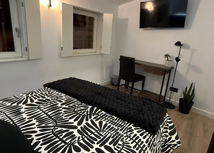 Adiva A Zapataria Konukevi Puentedeume